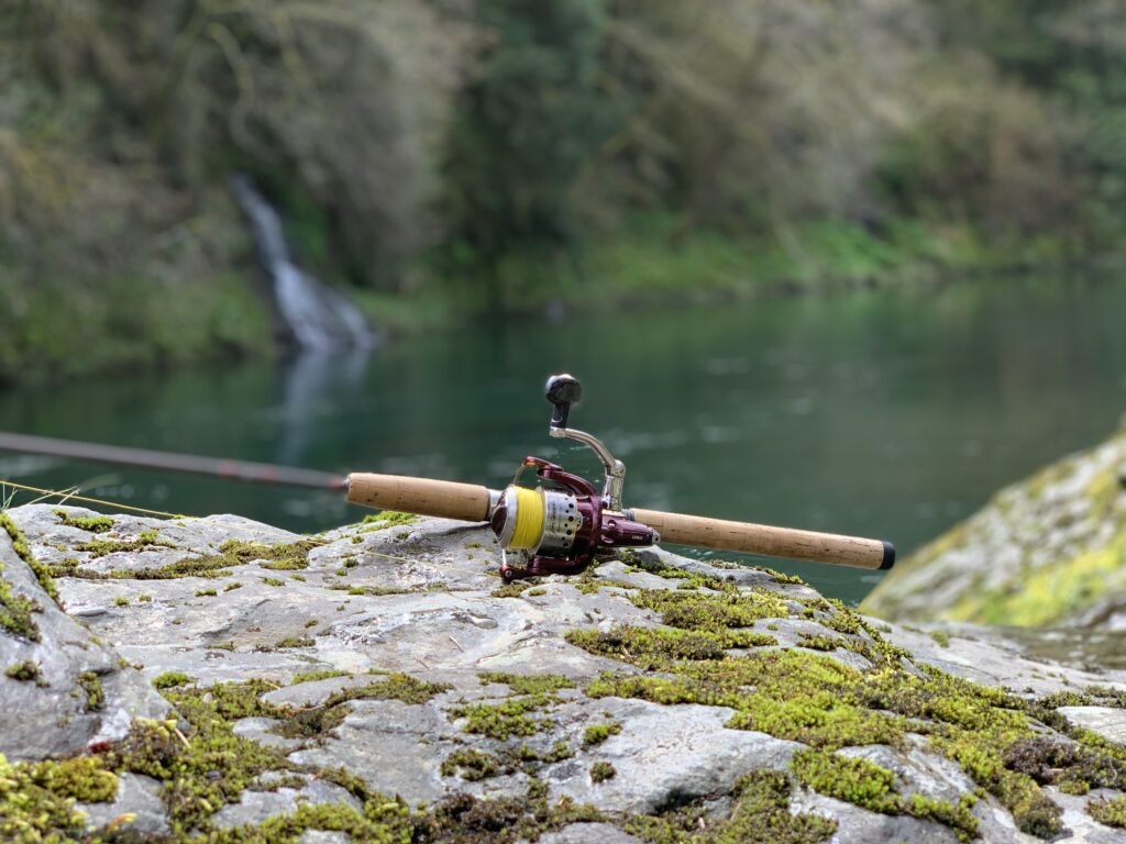 Spinning reel setup for salmon fishing on a Pacific Northwest river