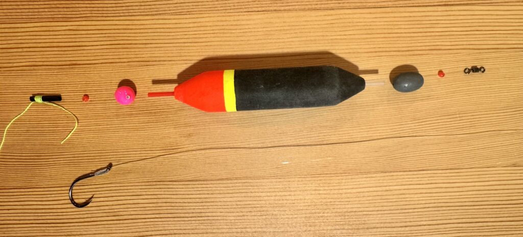 Salmon float fishing terminal tackle system laid out in rigging order