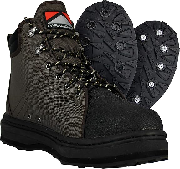 Paramount Outdoors Stonefly wading boots with cleated sole and studs for river fishing.